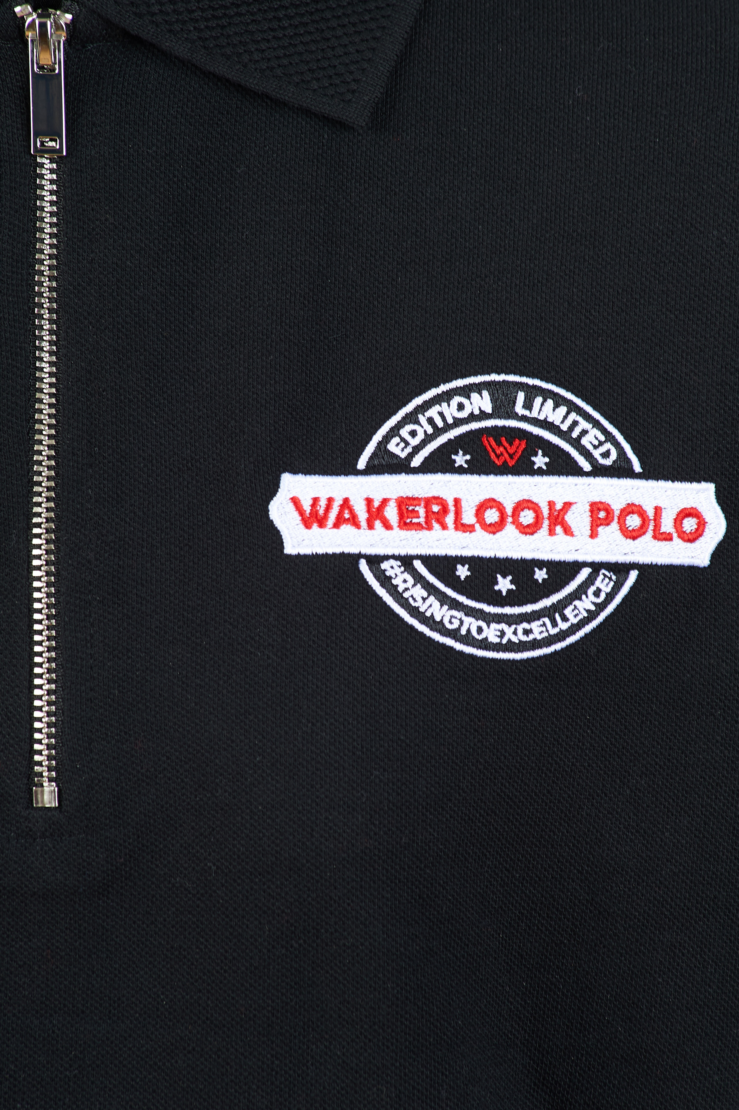 Wakerlook Men's Black Zip Polo featuring a classic fit, high polish silver zip, and jacquard knit collar and cuffs, elegantly displayed in a luxury red box.