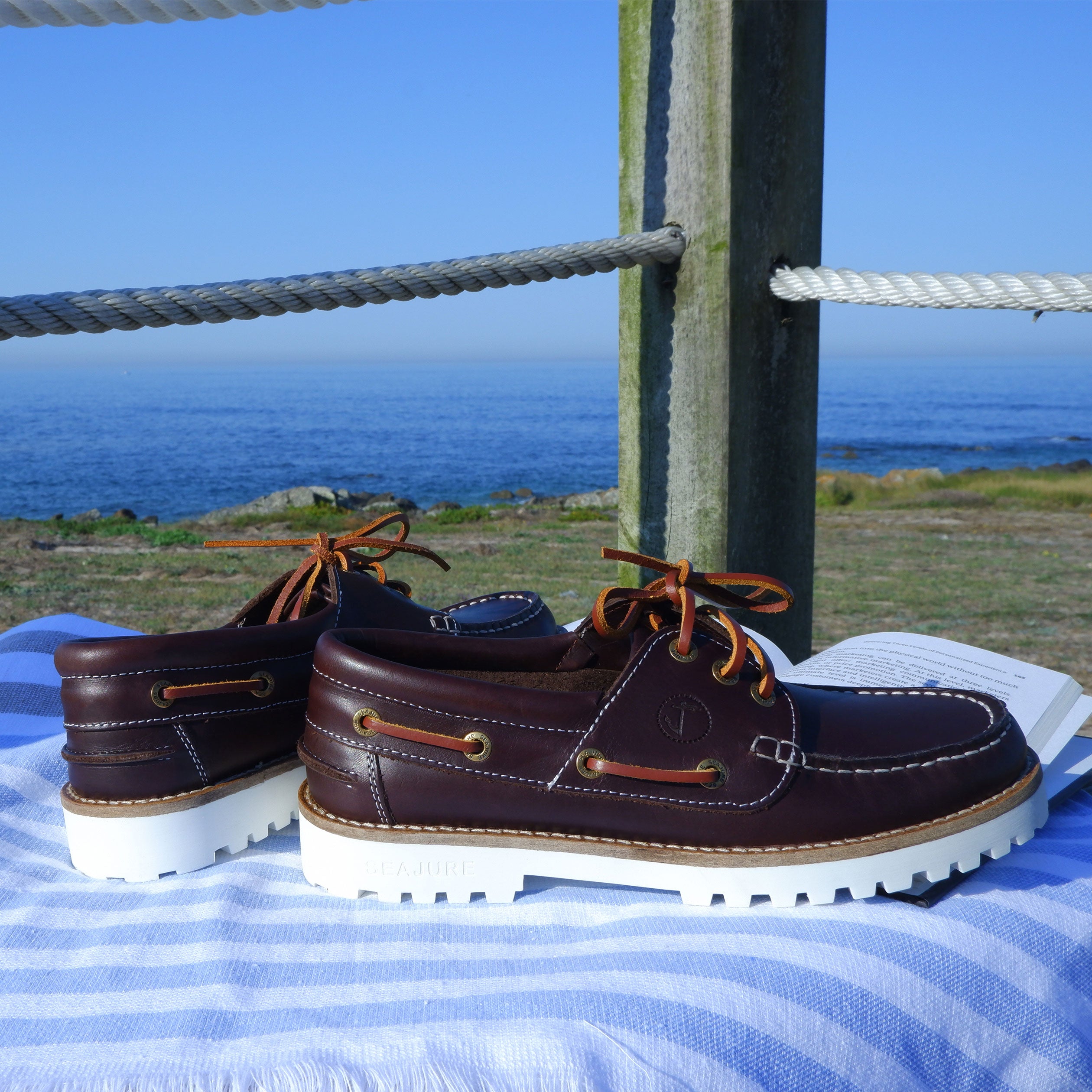 Alankuda Brown Leather Women Boat Shoe showcasing premium leather and stylish design.