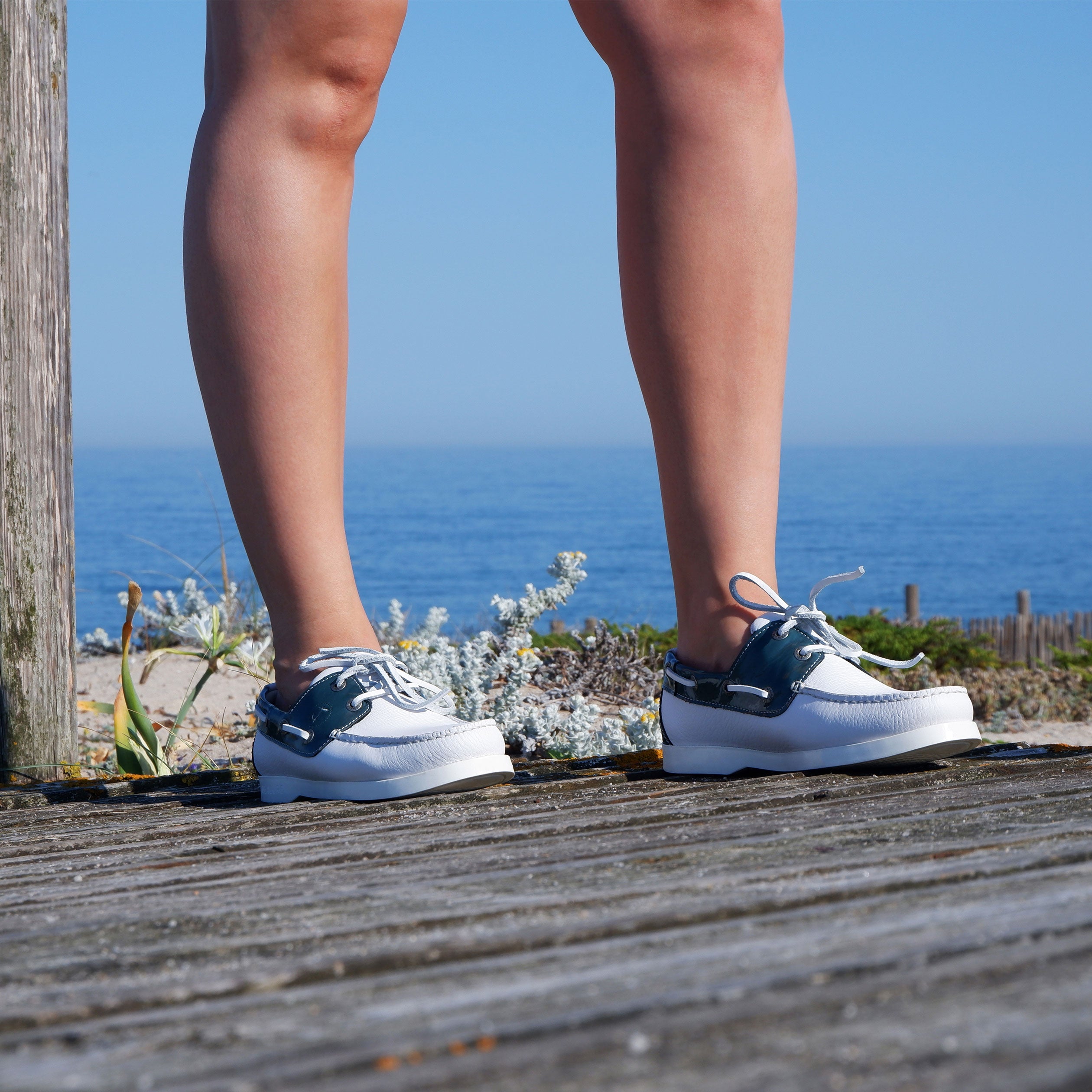 Gidaki women boat shoe featuring high-quality leather, elegant design, and durable sole, perfect for nautical adventures.