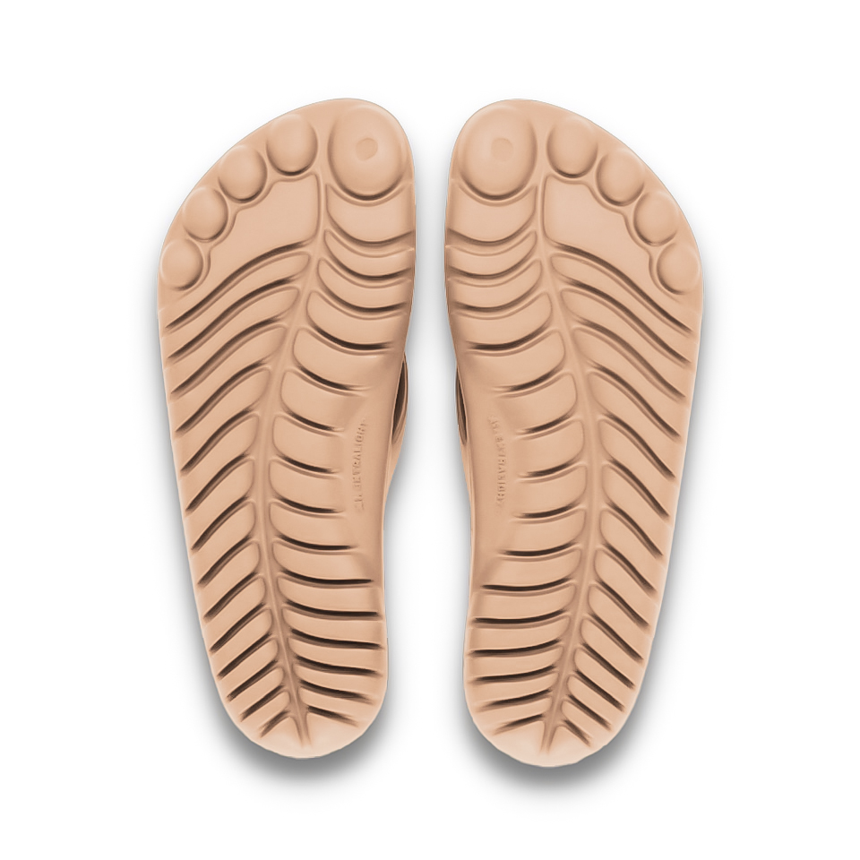 Beach Nude Flip-Flops with a waterproof drybag, showcasing a minimalist design and eco-friendly materials.