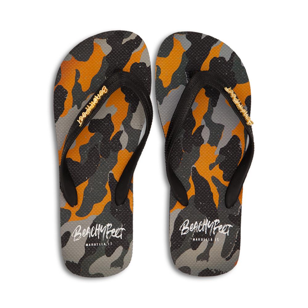 BeachyFeet® Decadente flip flops featuring orange, grey, and black camo print with a black strap and gold emblem.