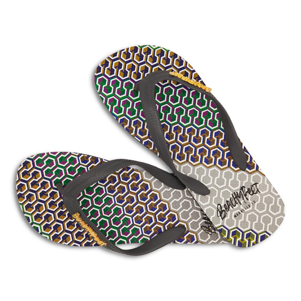 BeachyFeet® - Dreamers flip flops featuring a colorful intertwined pattern and gold emblem, perfect for beach and nightlife.