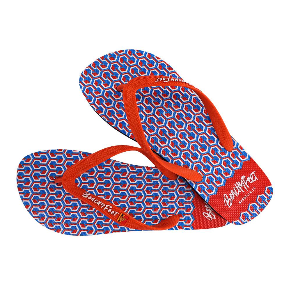 BeachyFeet® Eclipse Naranja flip flops featuring a vibrant design, gold emblem, and rugged strap, perfect for summer adventures.