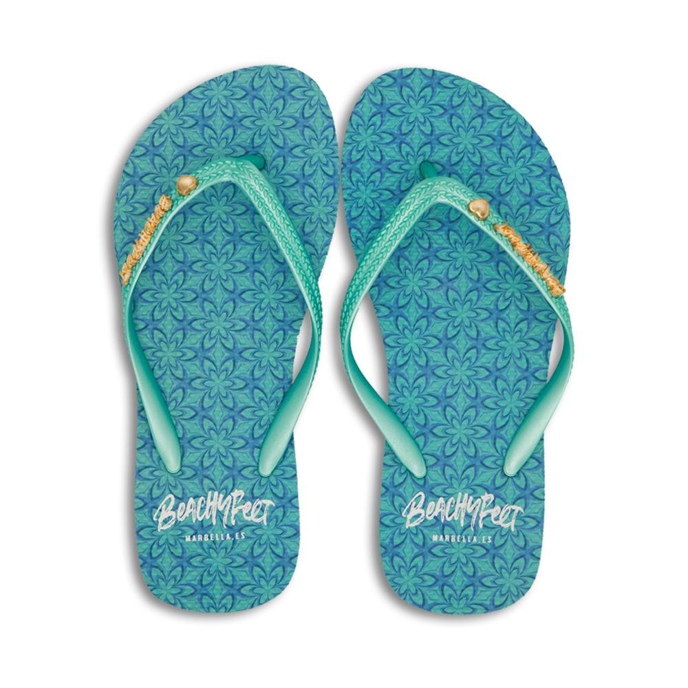 BeachyFeet® - Larimar flip flops featuring a pastel geometric floral design with a turquoise strap and gold emblem.