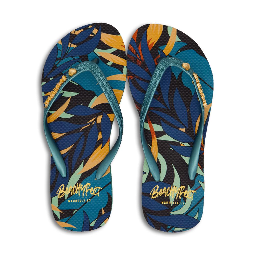 BeachyFeet® - Las Palmeras flip flops featuring tropical palm print, turquoise sole, and heart embellishment.