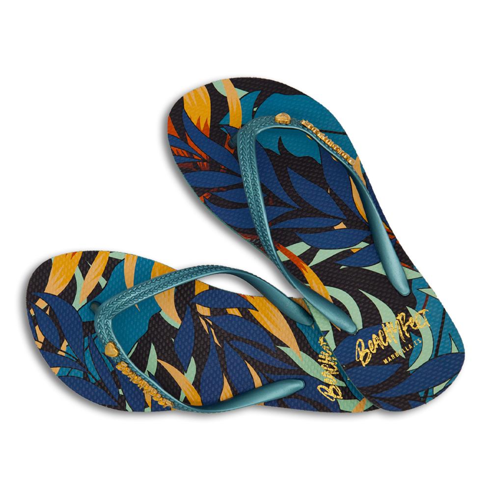 BeachyFeet® - Las Palmeras flip flops featuring tropical palm print, turquoise sole, and heart embellishment.