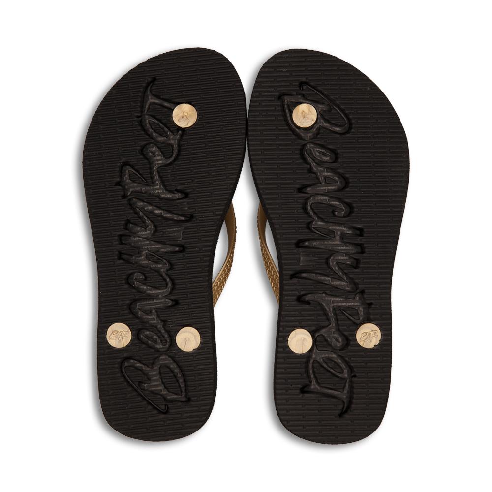 BeachyFeet® Mandala flip flops featuring a black and gold bohemian print with an orange strap and golden emblem.