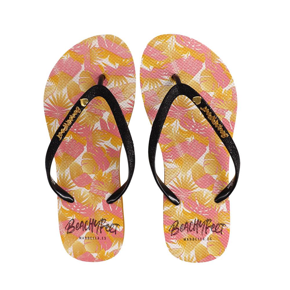 BeachyFeet® - Rosa Tropical flip flops featuring a slimmer strap and gold emblem, perfect for summer wear.