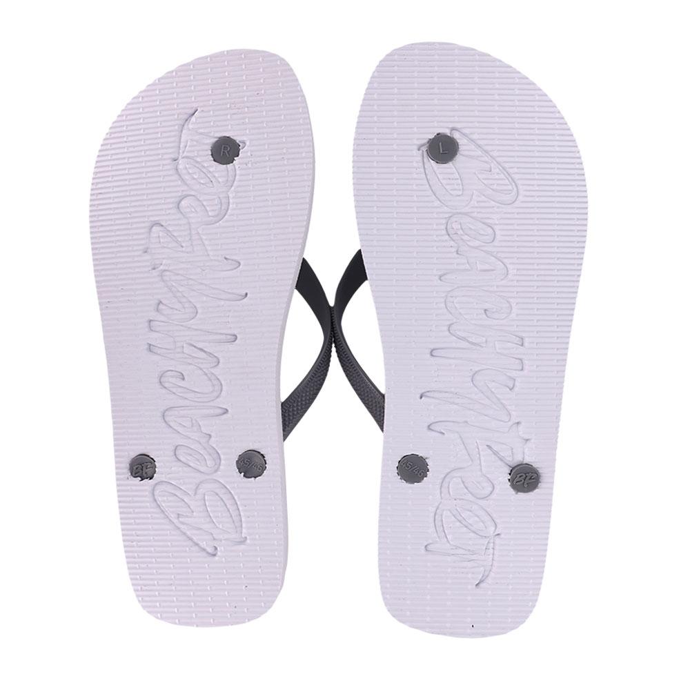 BeachyFeet® Waverider Blanco flip flops featuring a gold emblem, lightweight design, and textured footbed, perfect for summer wear.