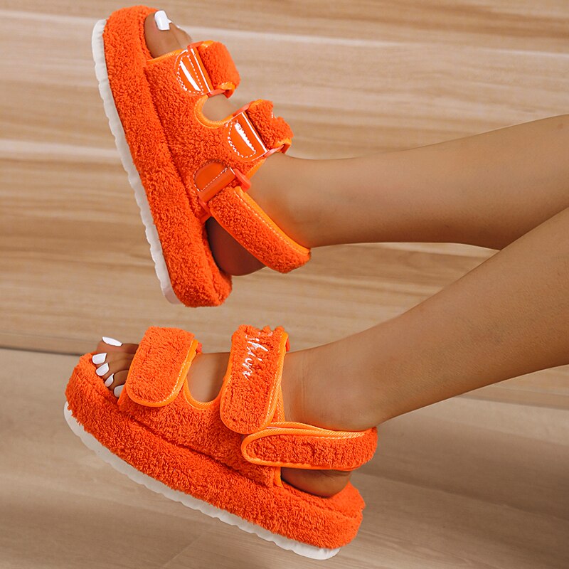 Casual thick bottom women sandals in orange, blue, black, and green colors, showcasing their stylish design and comfort.