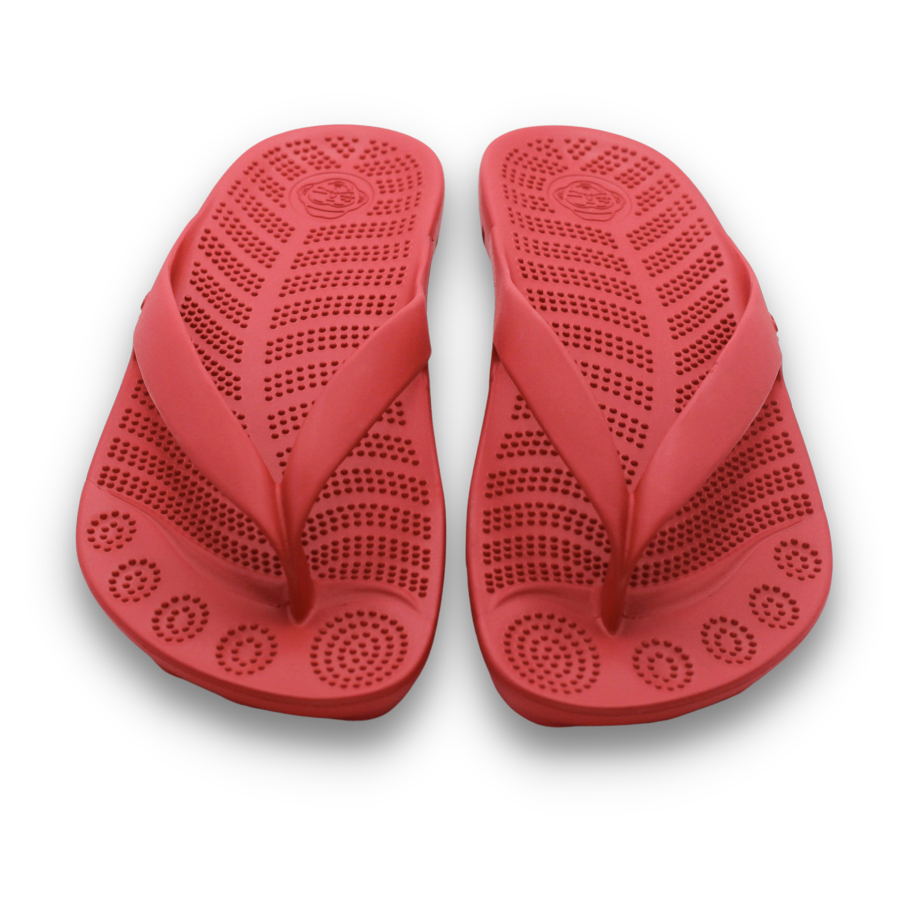 A pair of vibrant Fire Red Flip-Flops by GUDO, showcasing a minimalist design and unique sole pattern, perfect for beach and casual wear.