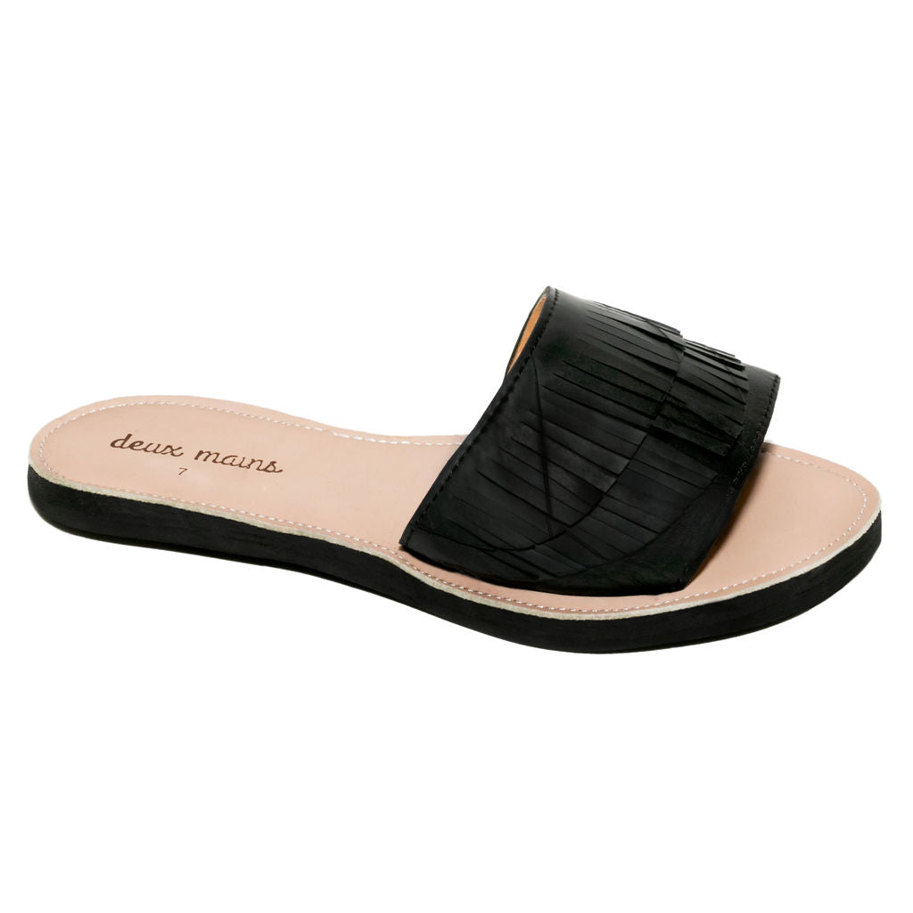 Stylish black Fringe Slide Sandal with edgy fringe detail, made from genuine leather and up-cycled materials.