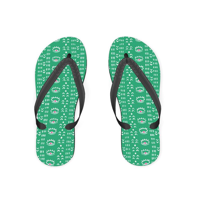 A pair of stylish Green-Eyed Women's Flip Flops with a vibrant design, perfect for summer outings.