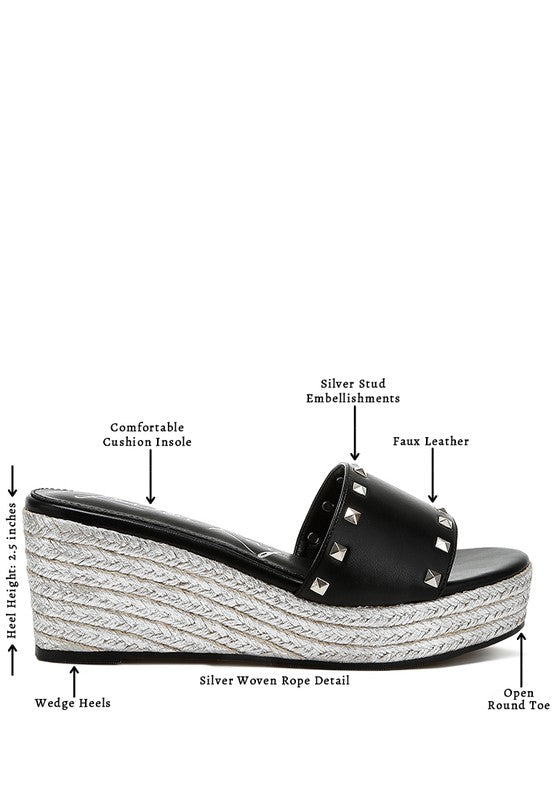 Lilja Slip On Espadrilles featuring metallic accents and stud embellishments on a woven wedge heel.