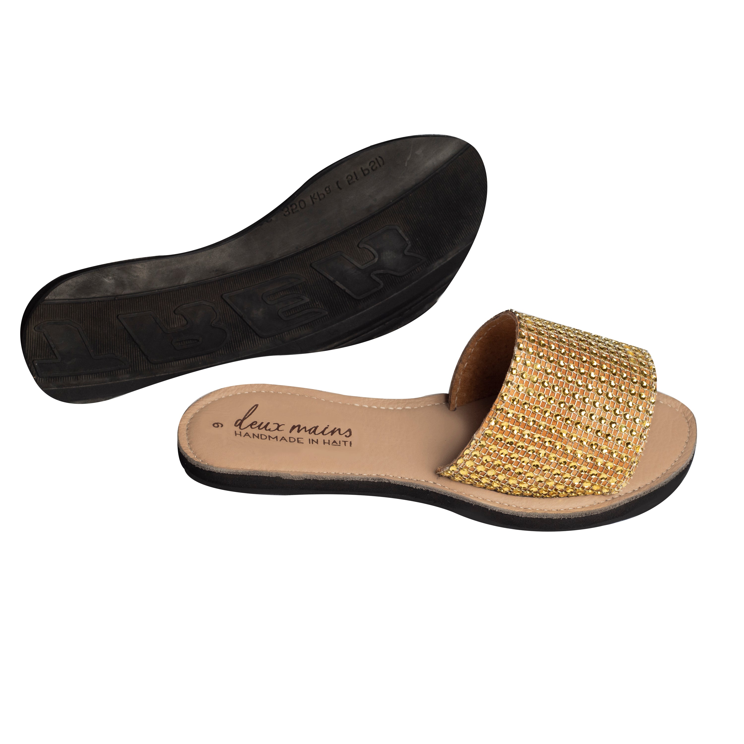 Elegant Love Wins Gold Slide sandals adorned with gold rhinestones, featuring eco-friendly repurposed tire soles for comfort and traction.