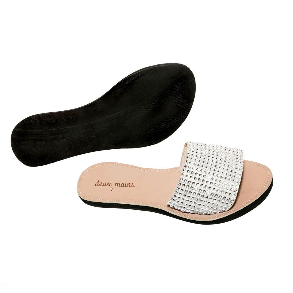 Elegant Love Wins Silver Slide sandals adorned with sparkling rhinestones and eco-friendly repurposed tire soles.