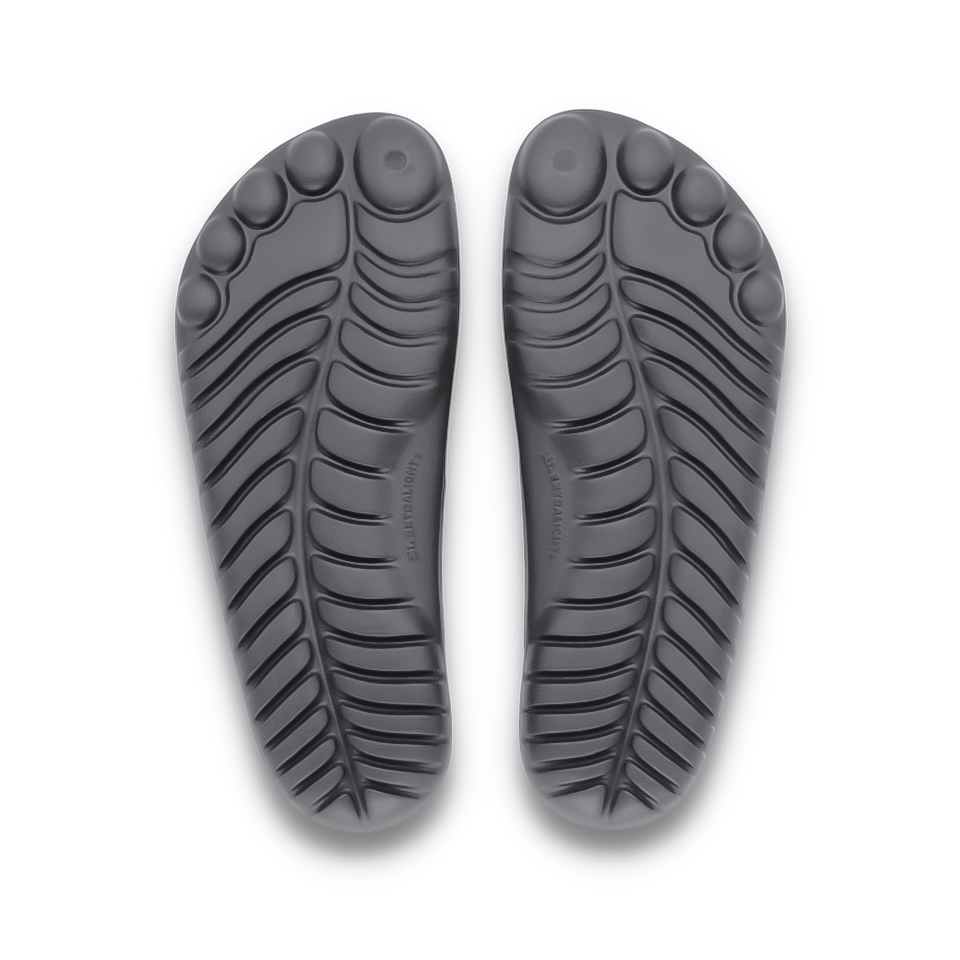 GUDO Night Platinum Flip-Flops showcasing a sleek minimalist design with a unique sole pattern.