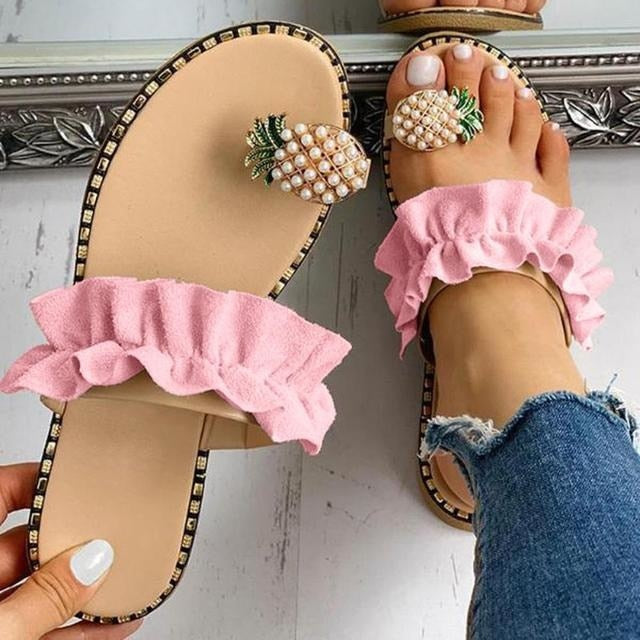 Pineapple Pearl Beach Slides featuring a stylish design with pearl embellishments, perfect for casual summer wear.