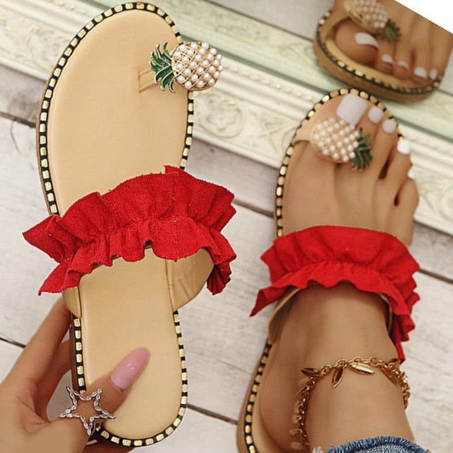 Pineapple Pearl Beach Slides featuring a stylish design with pearl embellishments, perfect for casual summer wear.