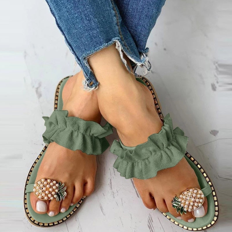 Pineapple Pearl Beach Slides featuring a stylish design with pearl embellishments, perfect for casual summer wear.