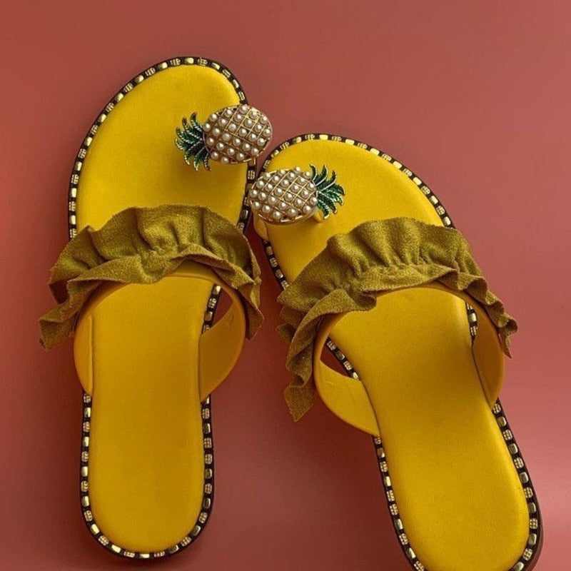 Pineapple Pearl Beach Slides featuring a stylish design with pearl embellishments, perfect for casual summer wear.