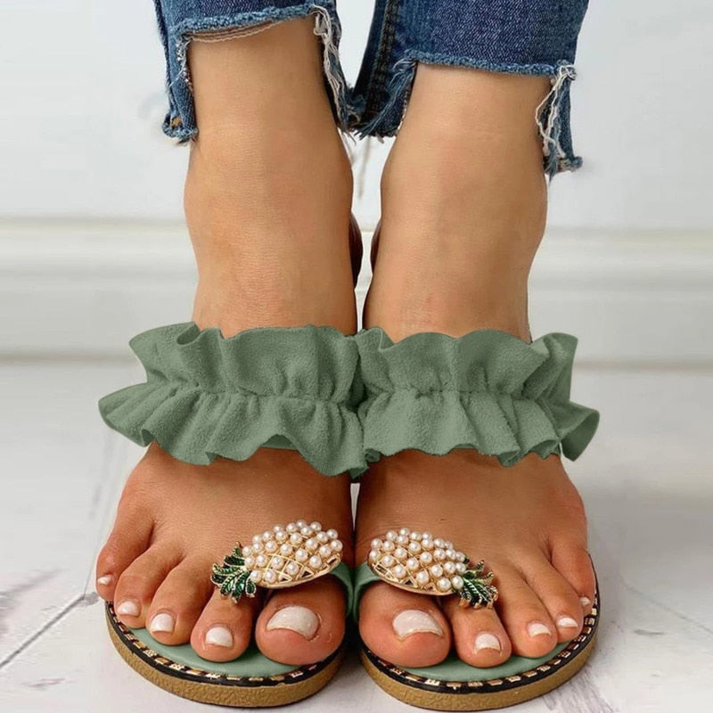 Pineapple Pearl Beach Slides featuring a stylish design with pearl embellishments, perfect for casual summer wear.