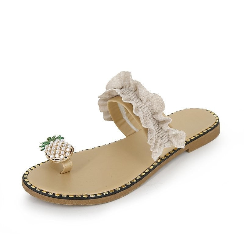 Pineapple Pearl Beach Slides featuring a stylish design with pearl embellishments, perfect for casual summer wear.