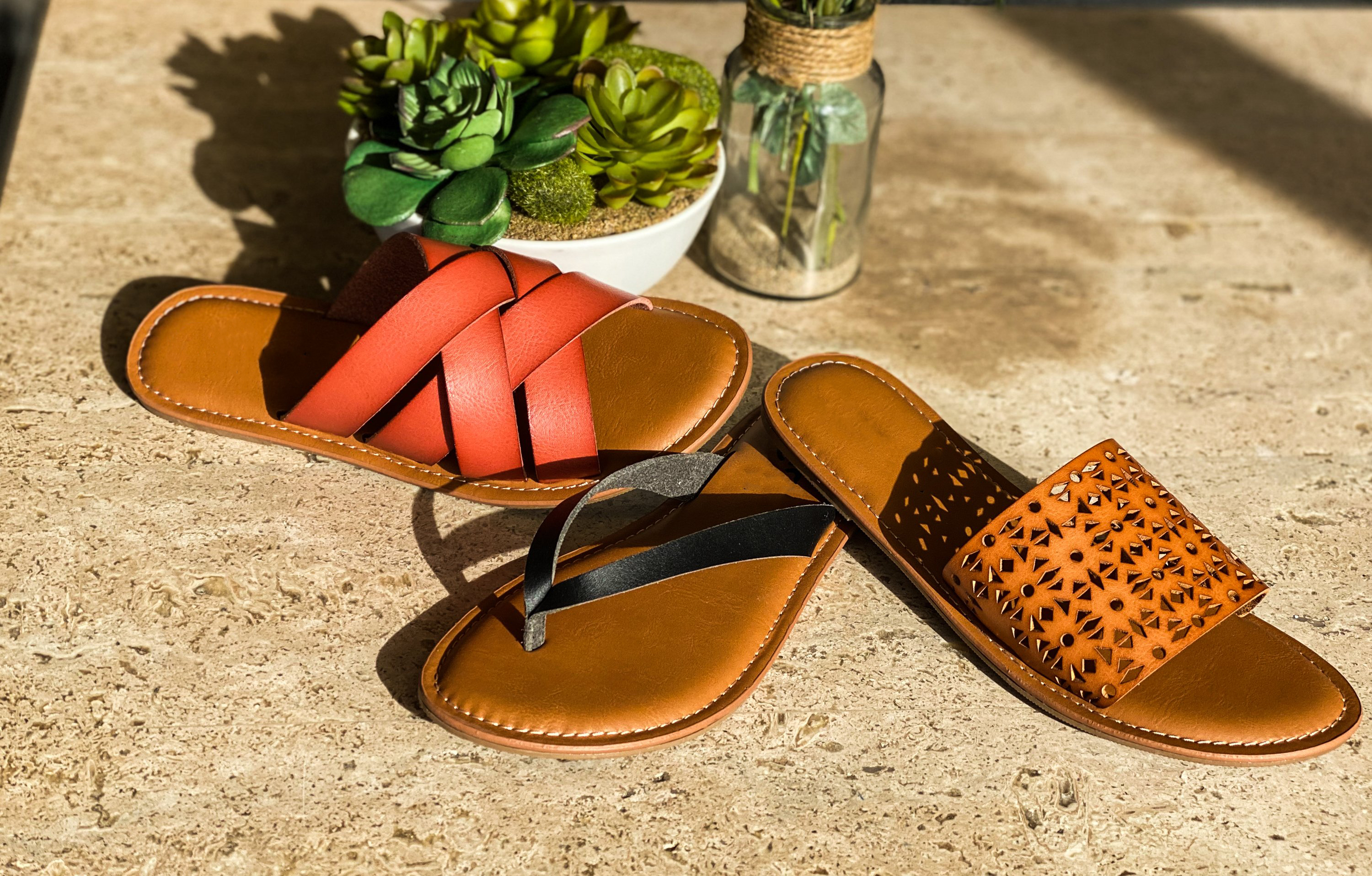 A pair of Women's Sandals Ibiza Black featuring a classic thong toe design and slim straps, perfect for summer wear.