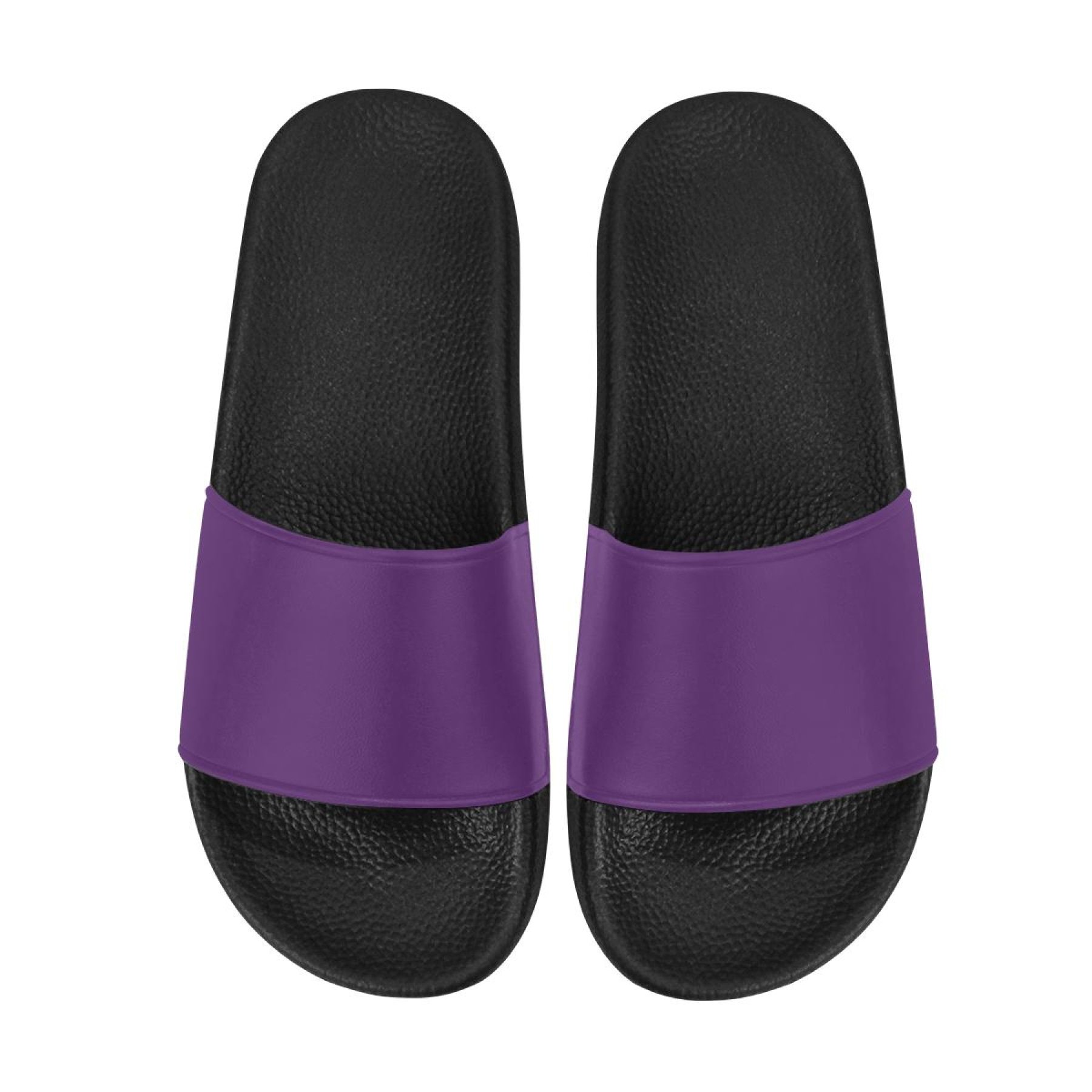 A pair of women's deep purple slides with a cushioned foaming strap and open toe design, perfect for casual wear.