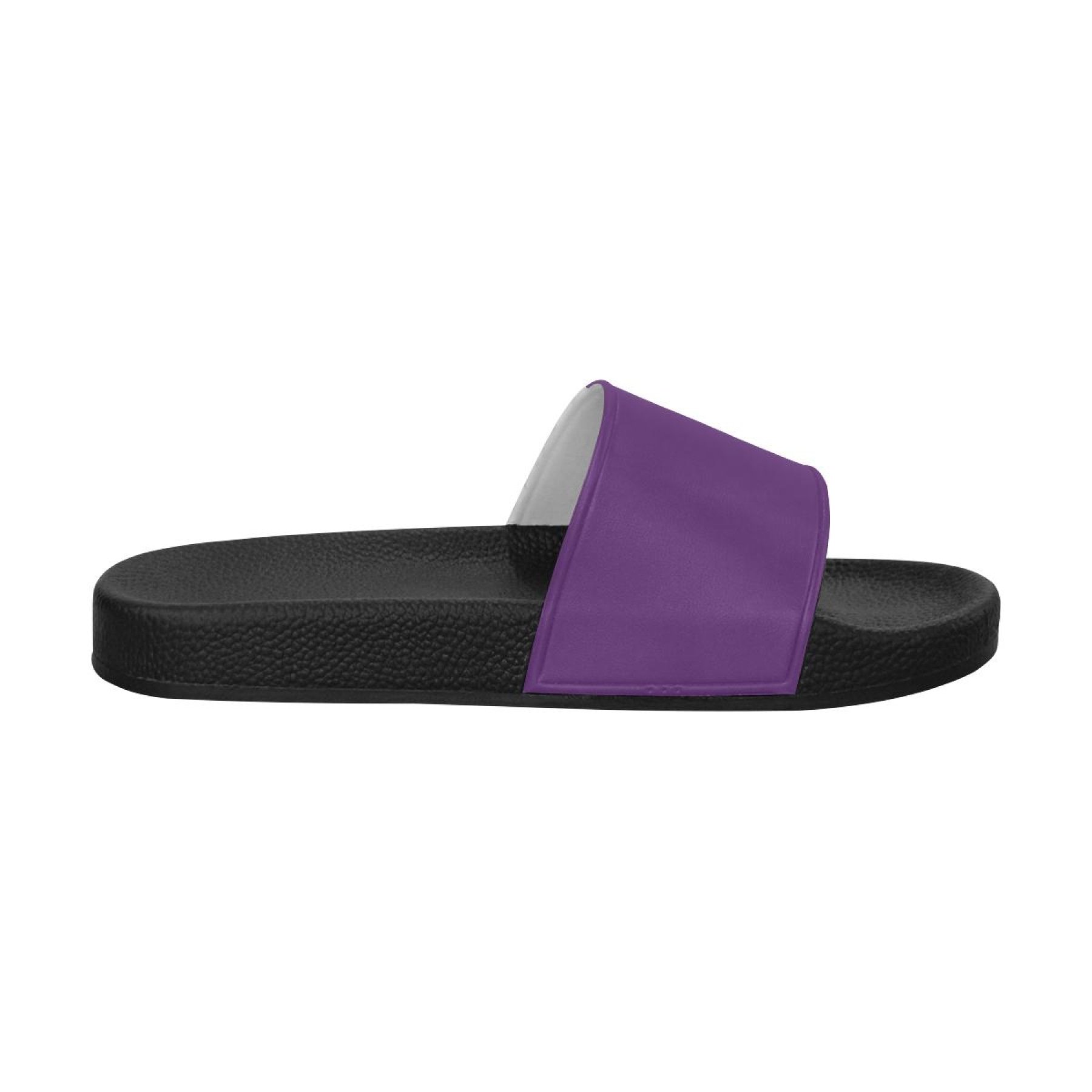 A pair of women's deep purple slides with a cushioned foaming strap and open toe design, perfect for casual wear.