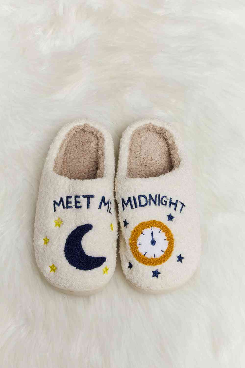 A pair of Comfy Cozy Plush Slide Slippers featuring a soft faux fur top and a durable rubber sole, perfect for indoor and outdoor use.