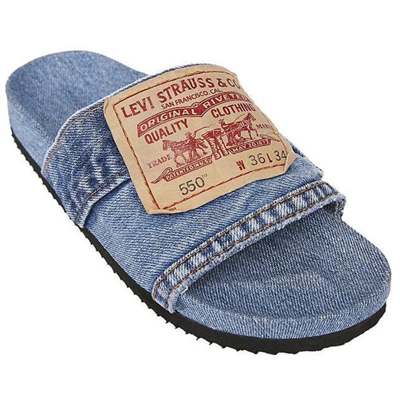 Denim Women's Cool Round Head Flat Slides in blue and black, showcasing a stylish round head design and comfortable flat sole.