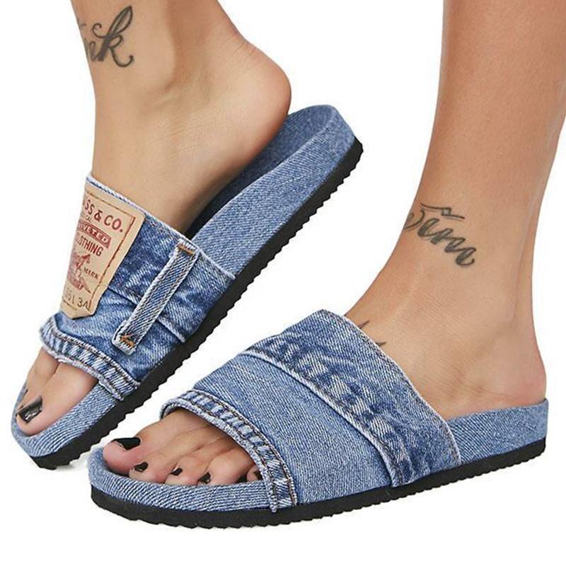 Denim Women's Cool Round Head Flat Slides in blue and black, showcasing a stylish round head design and comfortable flat sole.