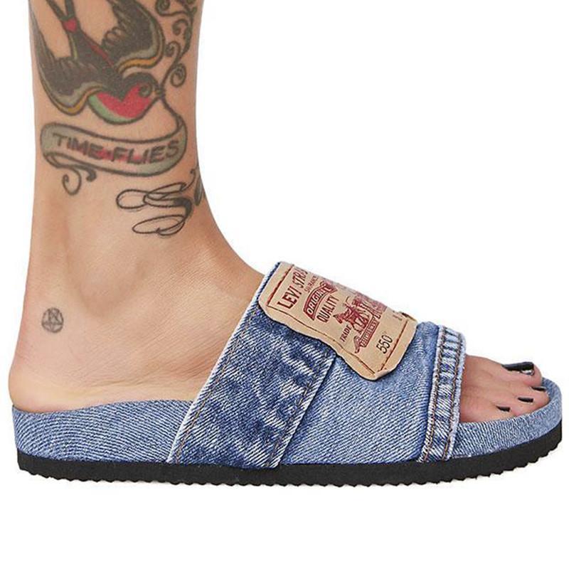 Denim Women's Cool Round Head Flat Slides in blue and black, showcasing a stylish round head design and comfortable flat sole.