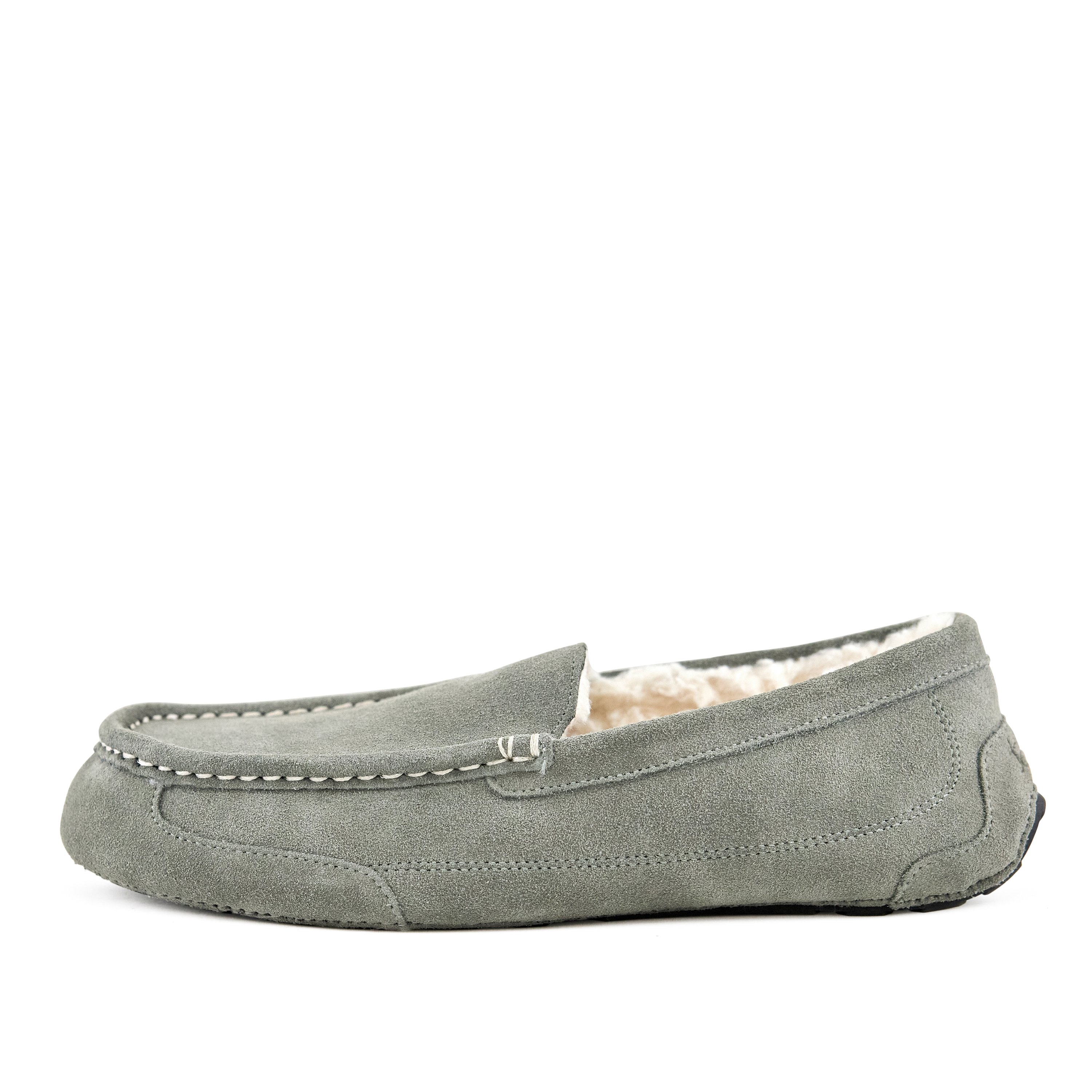 Men's moccasin slippers in Toasty Grey made from genuine suede with faux fur lining and rubber sole, designed for comfort and style.