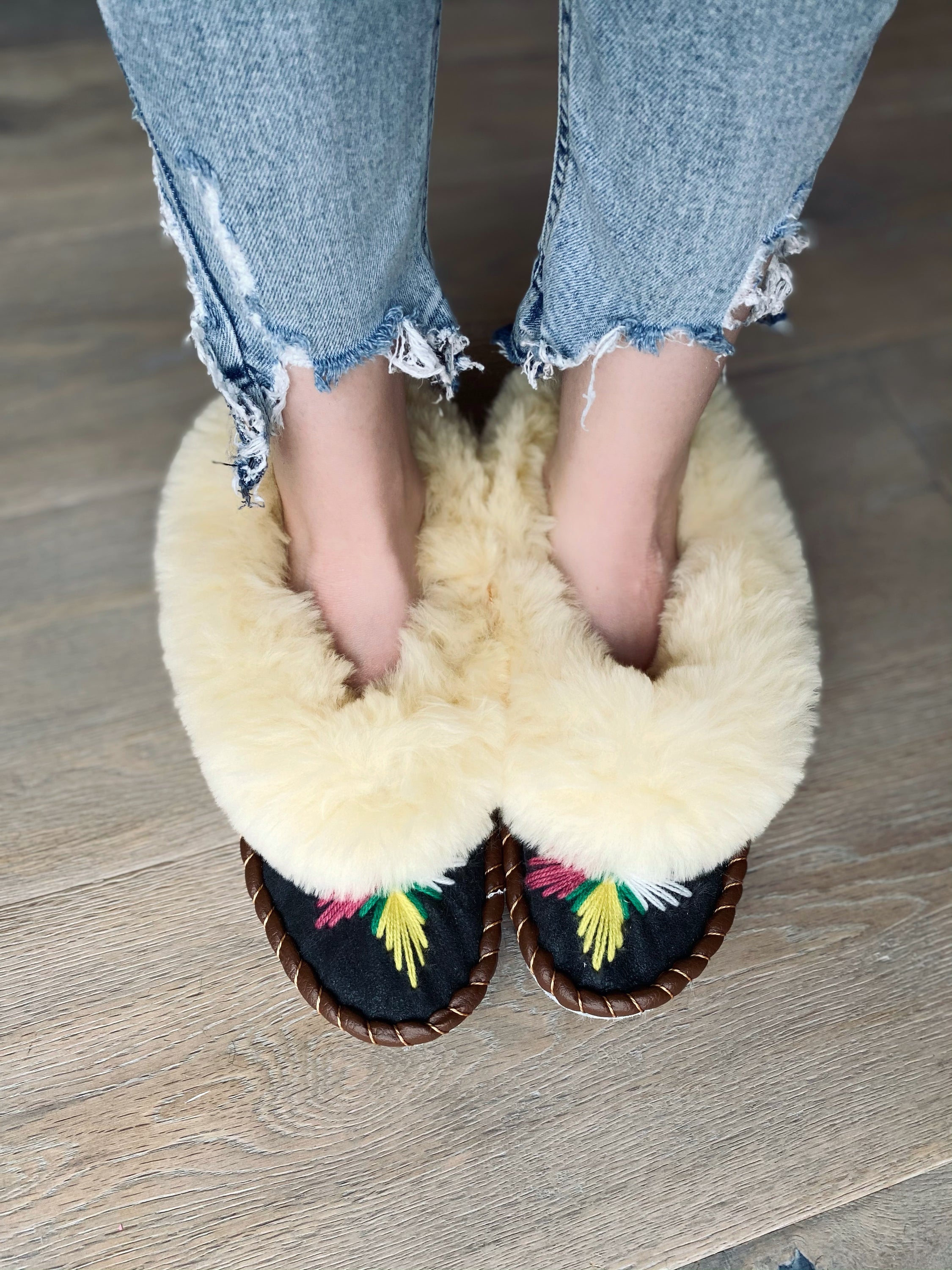 Natural Fur Embroidered Moccasin Slippers showcasing vibrant colors and a fluffy fur cuff, perfect for indoor comfort.