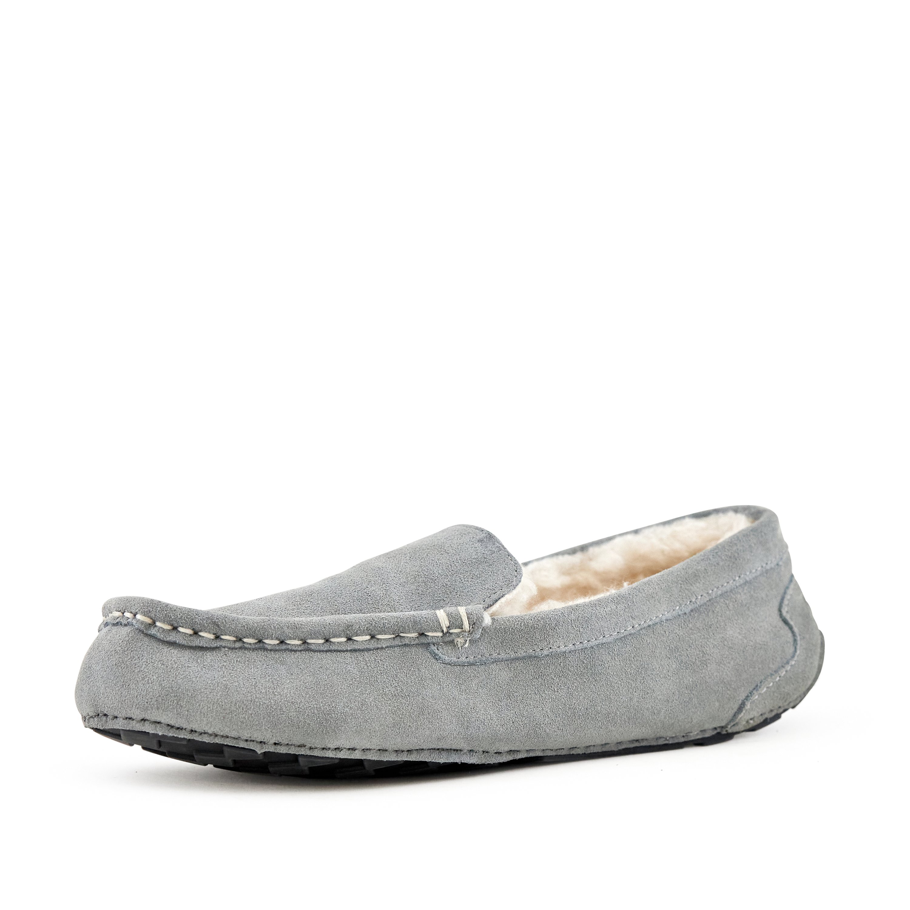 Cozy women's moccasin slippers in Toasty Light Grey, made from genuine suede with faux fur lining and rubber sole.