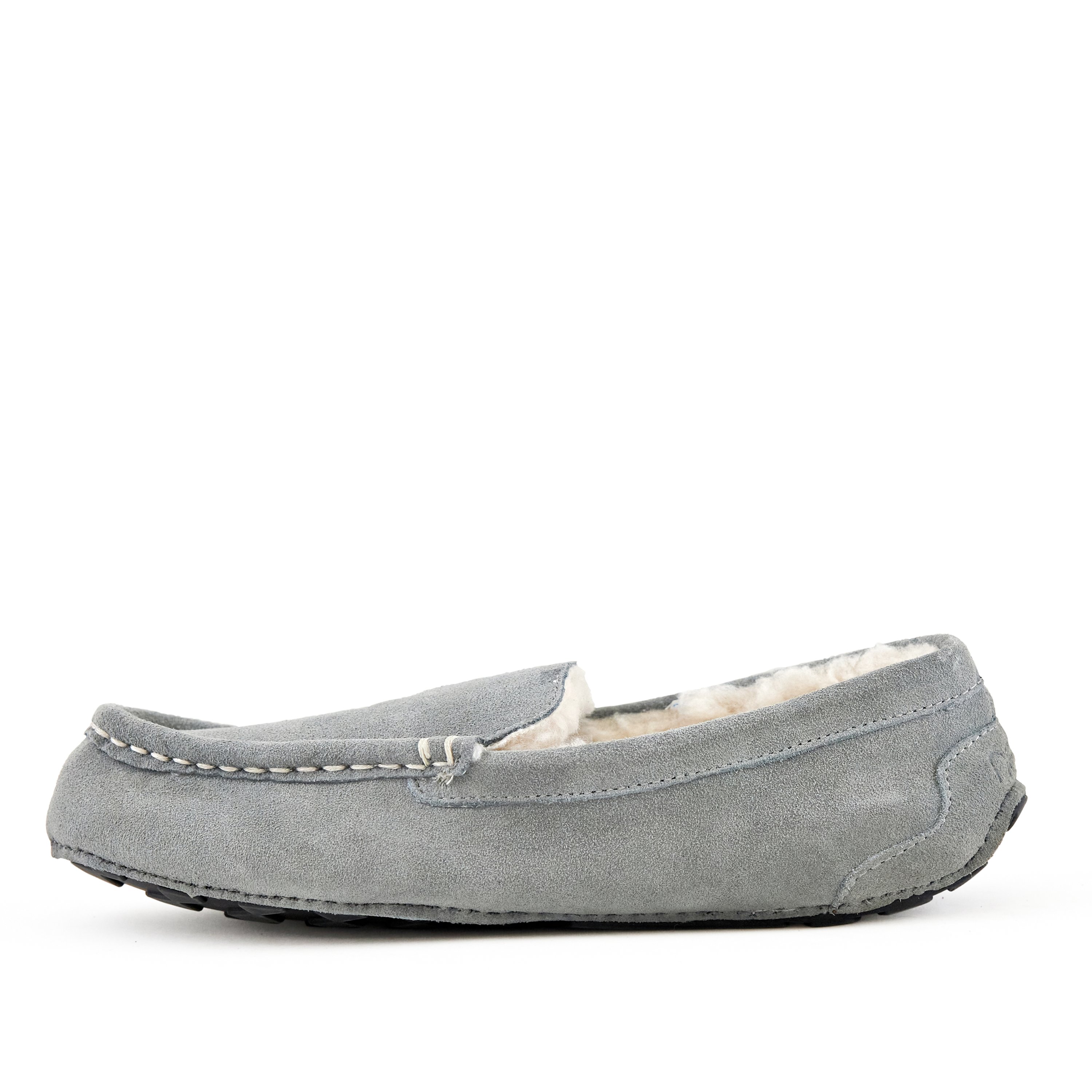 Cozy women's moccasin slippers in Toasty Light Grey, made from genuine suede with faux fur lining and rubber sole.