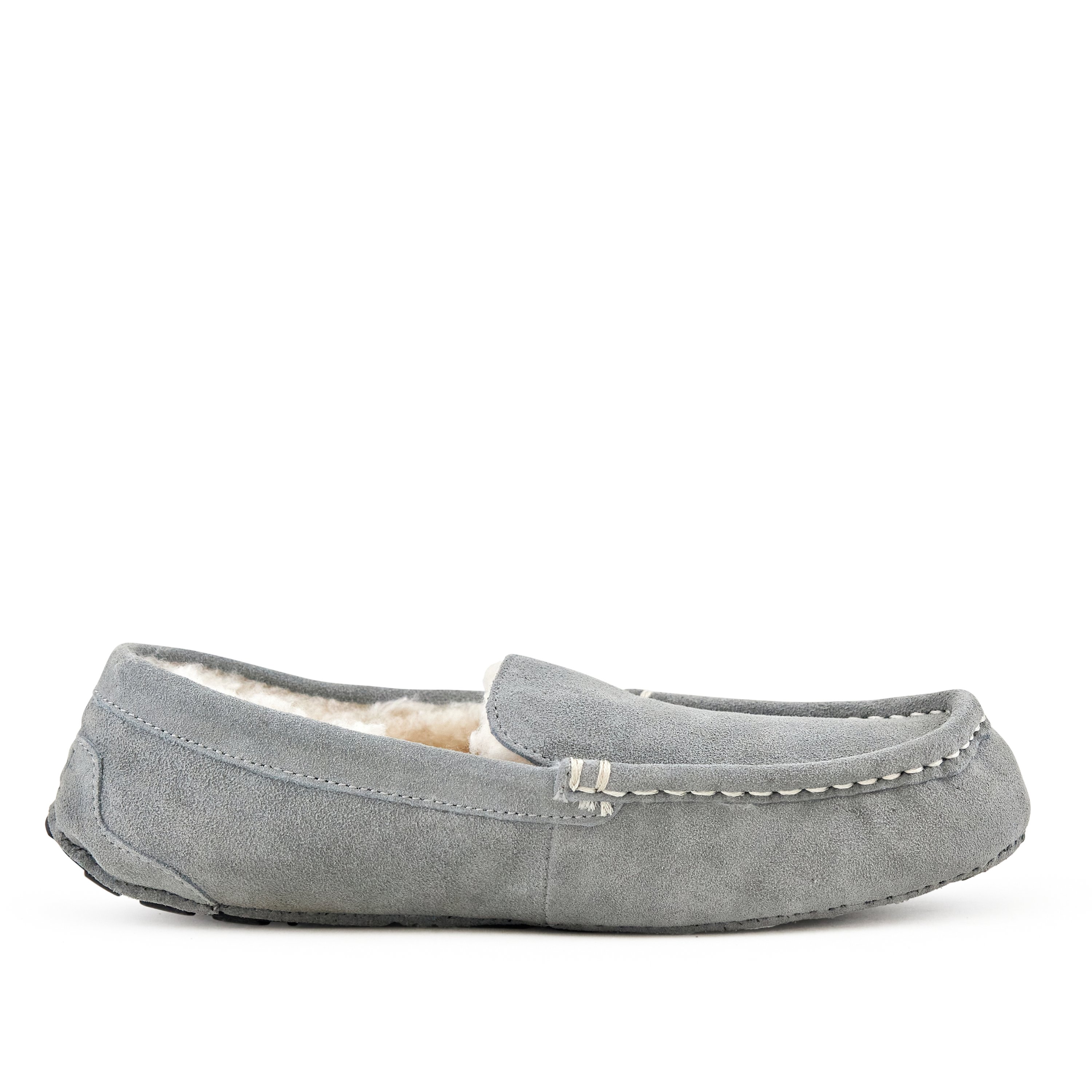 Cozy women's moccasin slippers in Toasty Light Grey, made from genuine suede with faux fur lining and rubber sole.