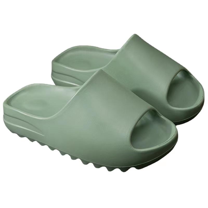 Yeezy Inspired Slides in vibrant green color, showcasing a stylish and comfortable design perfect for casual wear.