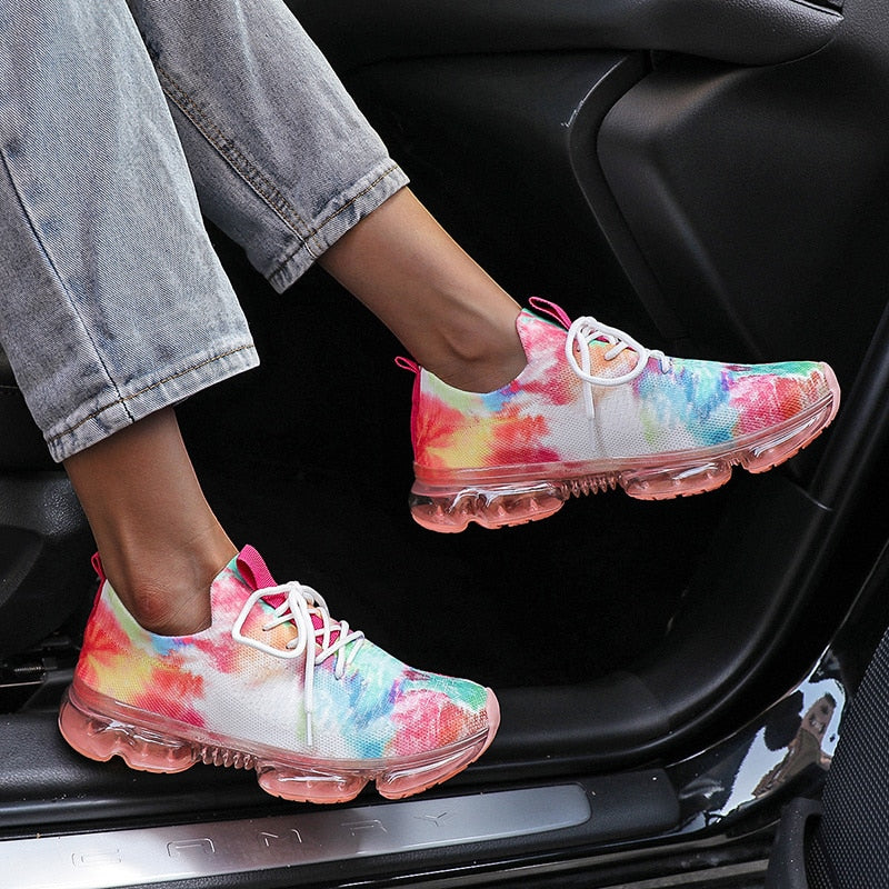 Colorful mesh running sport shoes for women with lace-up design, showcasing vibrant colors and breathable material.