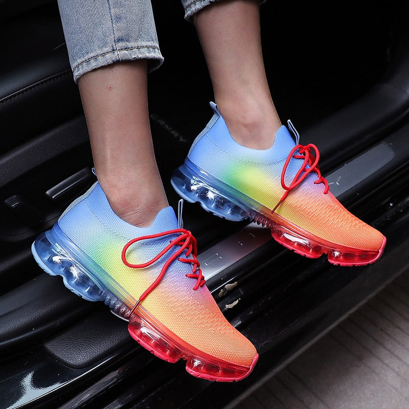 Colorful mesh running sport shoes for women with lace-up design, showcasing vibrant colors and breathable material.