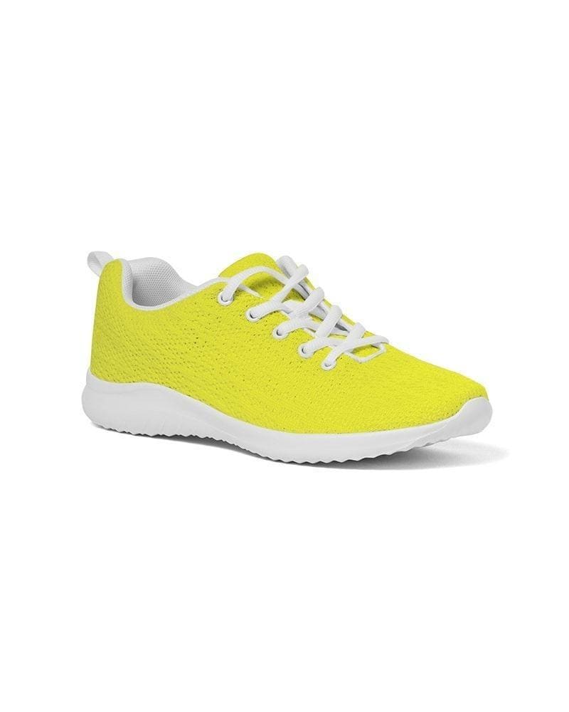 Men's yellow low top canvas running sports shoes with lace-up front, breathable lining, and padded collar, perfect for athletic activities.