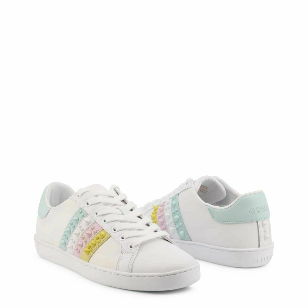 Rainbow Stud Sneakers featuring colorful studs on a white leather background with a rubber sole.