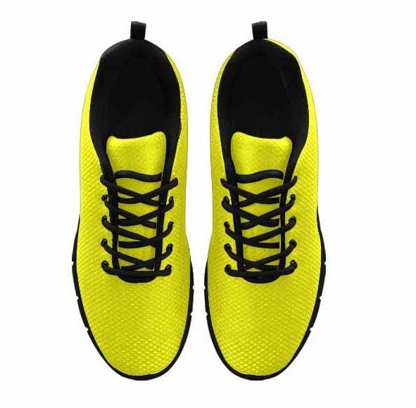 Bright yellow running shoes for men with a durable outsole and breathable mesh design.