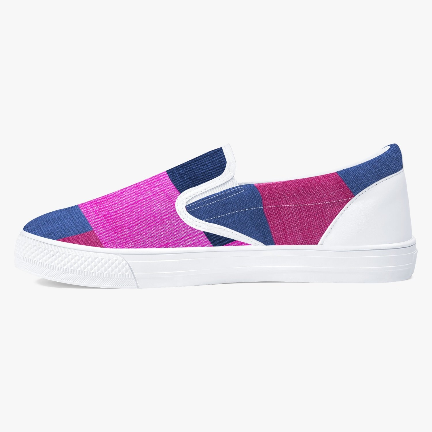 A pair of stylish white low-top slip-on canvas sports shoes designed for women, showcasing a sleek and modern athletic look.