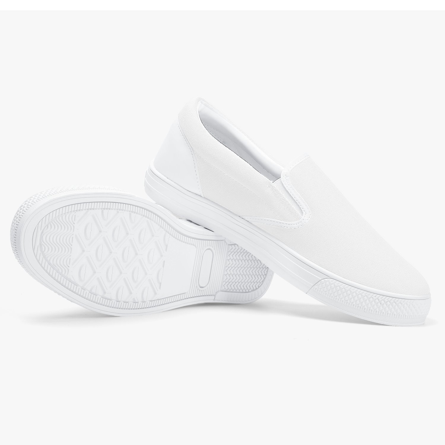 A pair of stylish white low-top slip-on canvas sports shoes designed for women, showcasing a sleek and modern athletic look.