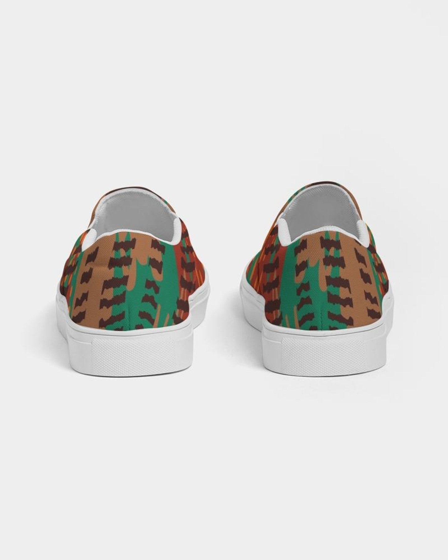 Women's canvas slip-on sneakers featuring a stylish brown and green print, designed for comfort and versatility.