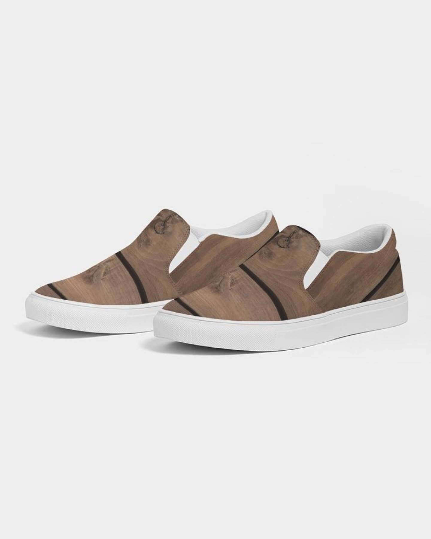 Women's canvas slip-on sneakers with a brown wood plank print, featuring elastic side accents and a padded collar.