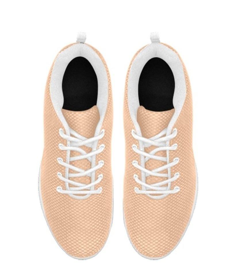 A pair of stylish Womens Sneakers in deep peach pink, featuring breathable mesh and a non-slip sole, perfect for running and casual wear.